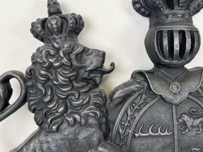 Large cast-iron coat of arms featuring the...