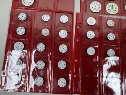A collection of 75 enameled pocket watch...