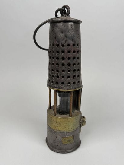 Miners' lamp made of metal and gilded metal.
H....