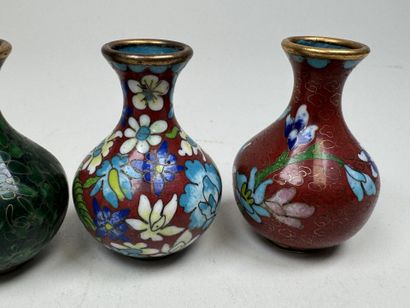 ASIA, 20th century.
Four small baluster vases...
