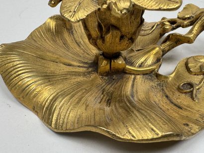 Handheld candlestick made of gilded bronze,...