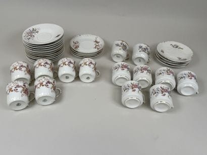 A set of polychrome and gold porcelain consisting...