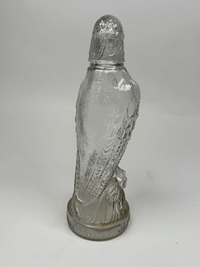 Molded glass promotional bottle featuring...