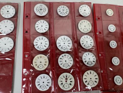 A collection of 75 enameled pocket watch...