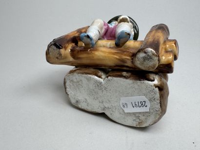 Polychrome earthenware match holder decorated...