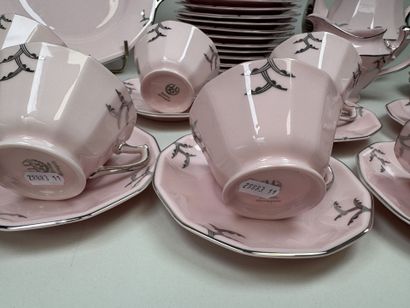 Ceramic dessert serving set on a pink background...