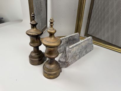 Set includes:
- a pair of bronze and cast-iron...