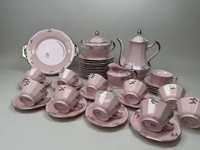 Ceramic dessert serving set on a pink background...