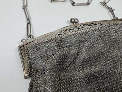 Large, openwork silver plated metal coin...