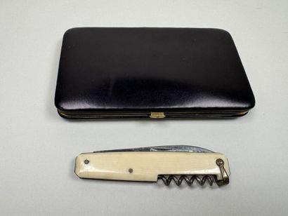 Set includes:
- LE TANNEUR.
Synthetic ivory-colored...