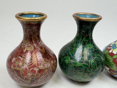 ASIA, 20th century.
Four small baluster vases...