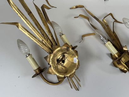 Paire d'appliques en métal doré à deux bras...