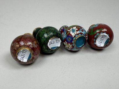 ASIA, 20th century.
Four small baluster vases...