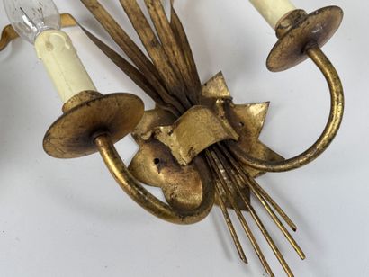 Paire d'appliques en métal doré à deux bras...