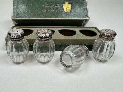 CHRISTOFLE.
4 cast-glass salt shakers with...