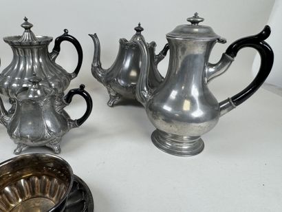 6 pewter shaped pieces including pourers.
H....