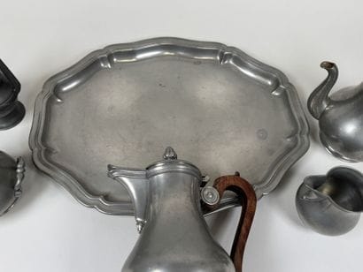 A coffee and tea service set made of pewter...