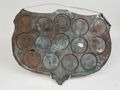 Large, coat-of-arms-shaped plaque made of...