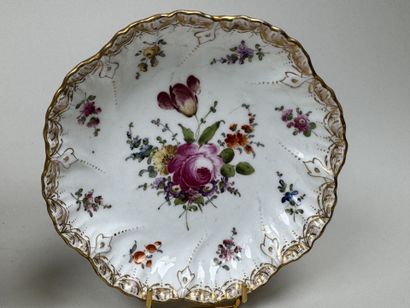 SAXE.
Two polychrome and gold porcelain bowls...