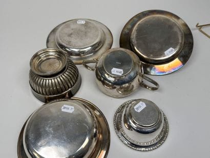 Silver plated metal set including:
- two...