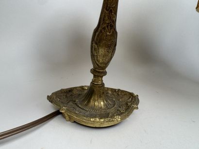 Two gilded, chiseled bronze bedside lamps...