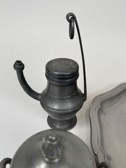 A coffee and tea service set made of pewter...