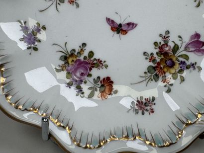 SAXE.
Two polychrome and gold porcelain bowls...