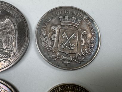 4 médailles en argent et argent doré à décor...