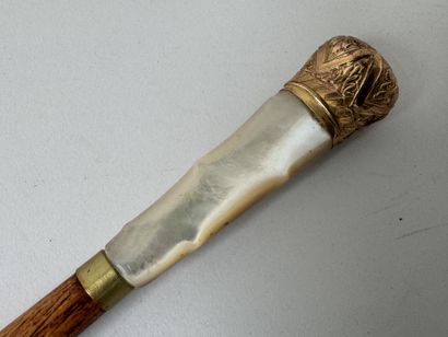 Wooden umbrella handle with a mother-of-pearl...