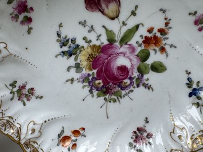 SAXE.
Two polychrome and gold porcelain bowls...