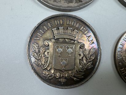 4 médailles en argent et argent doré à décor...