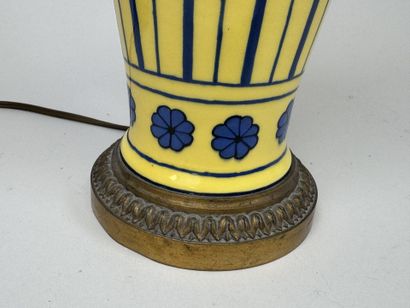 Yellow porcelain lamp decorated with birds...