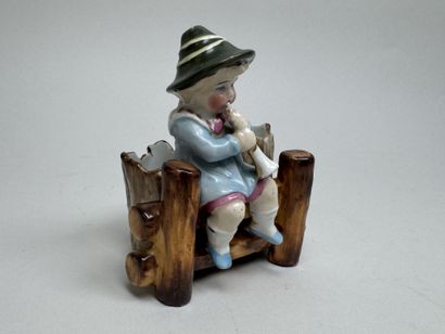 Polychrome earthenware match holder decorated...