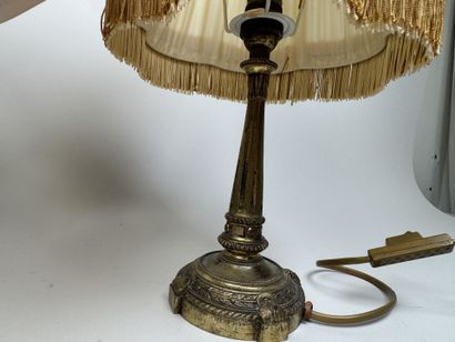 Two gilded, chiseled bronze bedside lamps...
