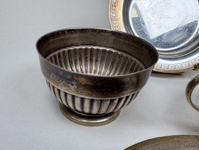 Silver plated metal set including:
- two...