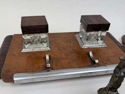 A collection of 11 desk inkwells with pen...