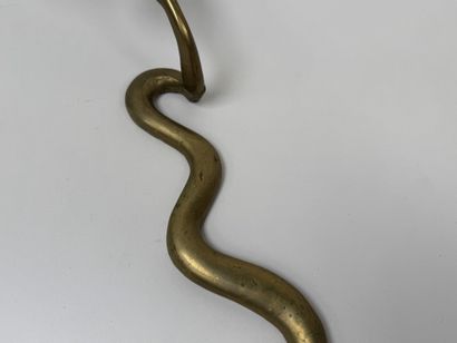 Brass wall sconce that doubles as a candleholder,...