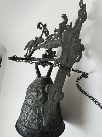 Bell and stand made of patinated bronze,...