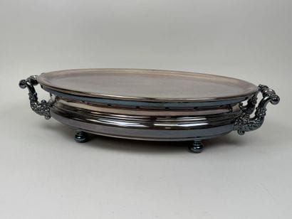 Large, oval-shaped double food warmer made...