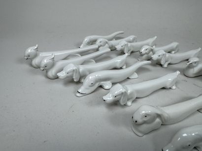 Set of 22 white porcelain knife holders with...
