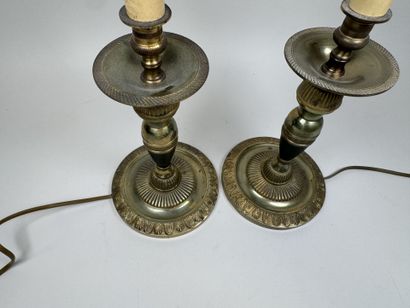 Pair of gilded bronze candlesticks with green...