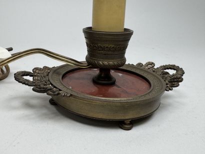 Small candlestick made of chiseled bronze...