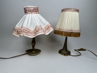 Two gilded, chiseled bronze bedside lamps...