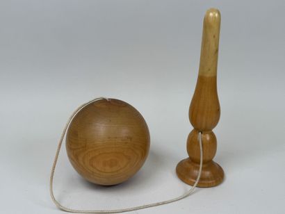 Hand-turned wooden cup-and-ball set.
H. 29...