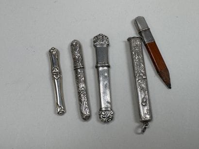 3 silver needle cases with chased and foliage...