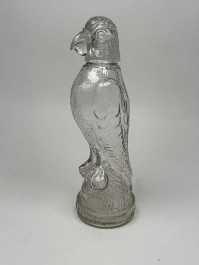 Molded glass promotional bottle featuring...
