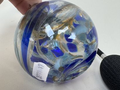 Colored glass perfume bottle and spray.
It...
