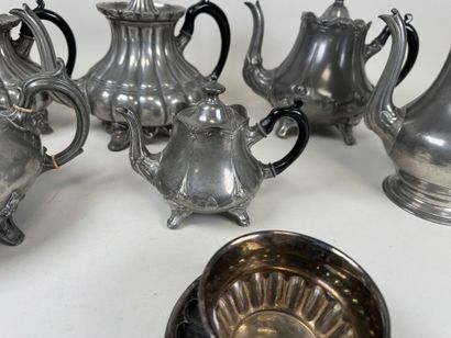 6 pewter shaped pieces including pourers.
H....