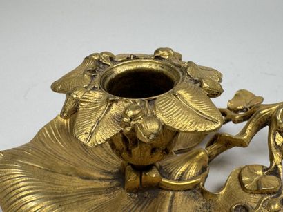 Handheld candlestick made of gilded bronze,...