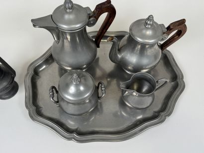 A coffee and tea service set made of pewter...